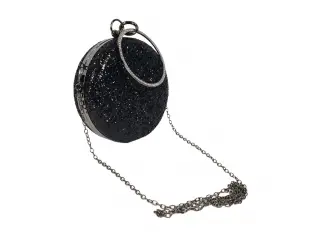 Geantă rotundă neagră - Tarina